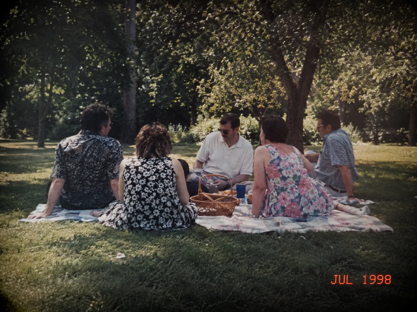 Synthetic dated copy: Synthetic vintage-style picnic photo with a printed July 1998 date, before and after one edit